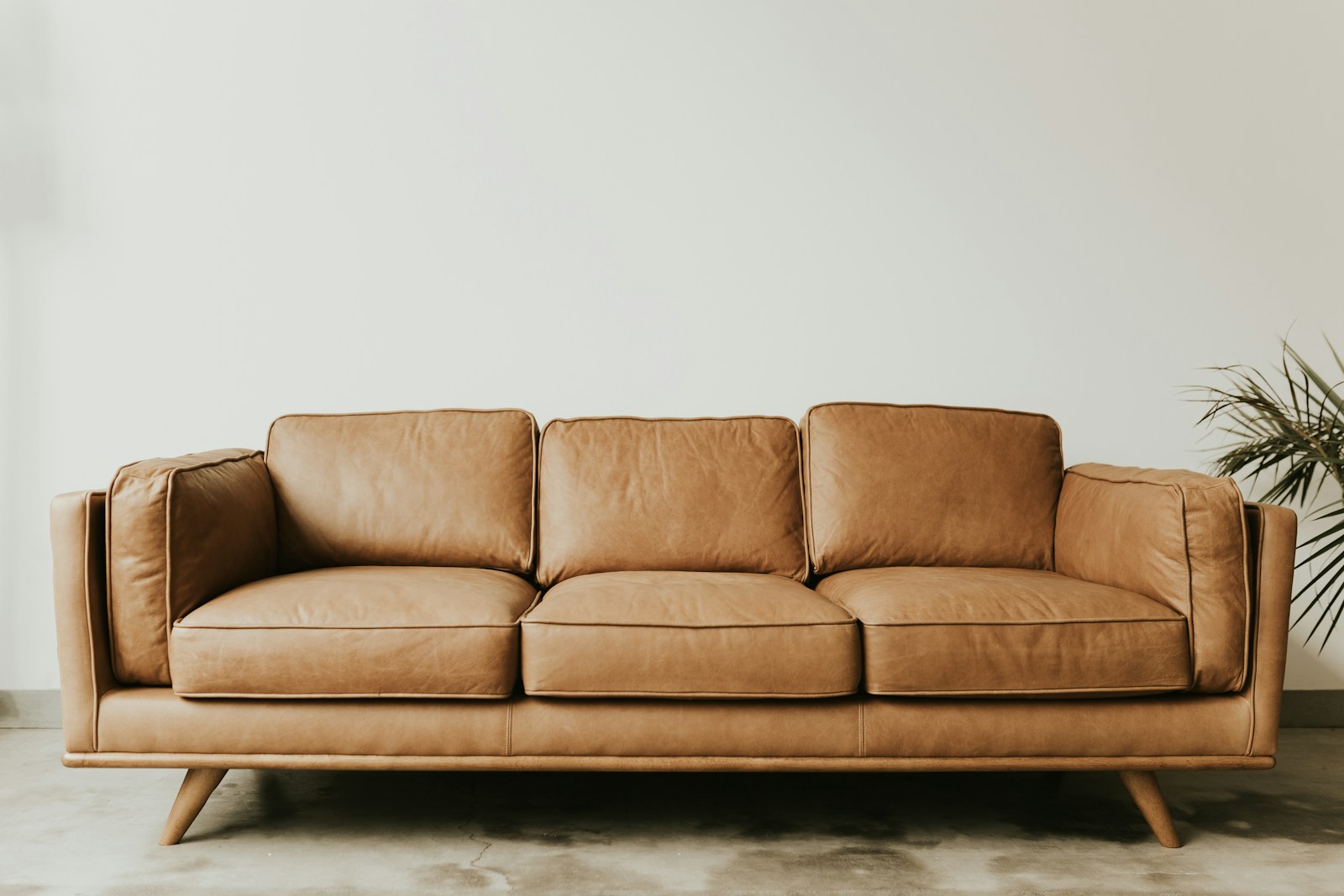 Heavy Item Moving in Dubai: brown leather 3-seat sofa